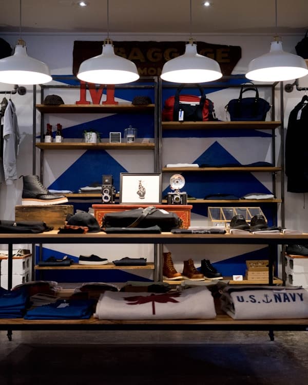 Inside a boutique — curated clothing racks and warm lighting
